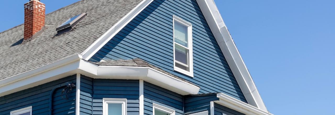 blue house on a clear day