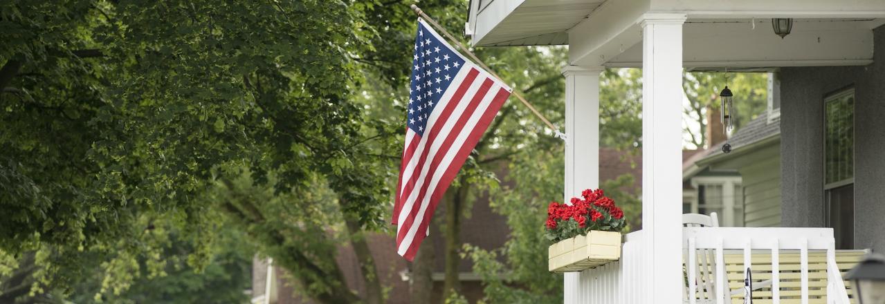 house with america flag flying