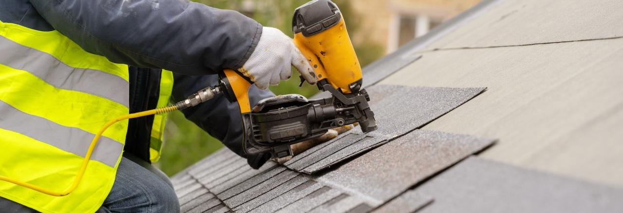 contractor installing roof