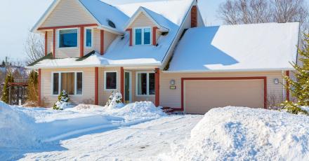 yellow house with red trim in March