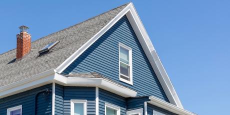 blue house on a clear day