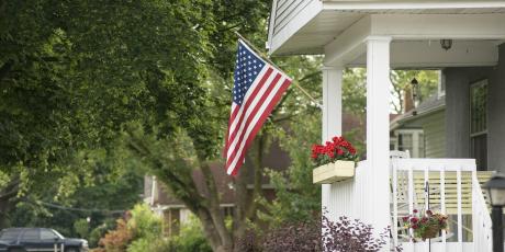 house with america flag flying