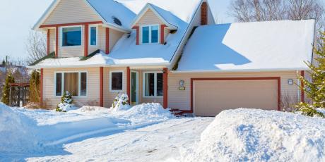 yellow house with red trim in March