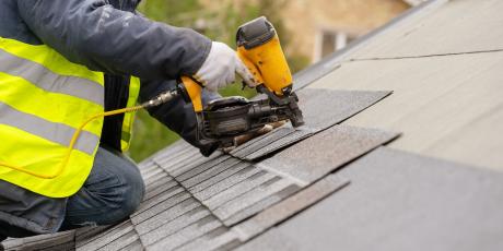 contractor installing roof
